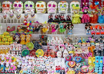 A variety of Dia de Muertos-themed confections, from sugar skulls to caskets