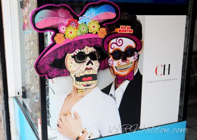A storefront sign is converted in the spirit of Dia de Muertos